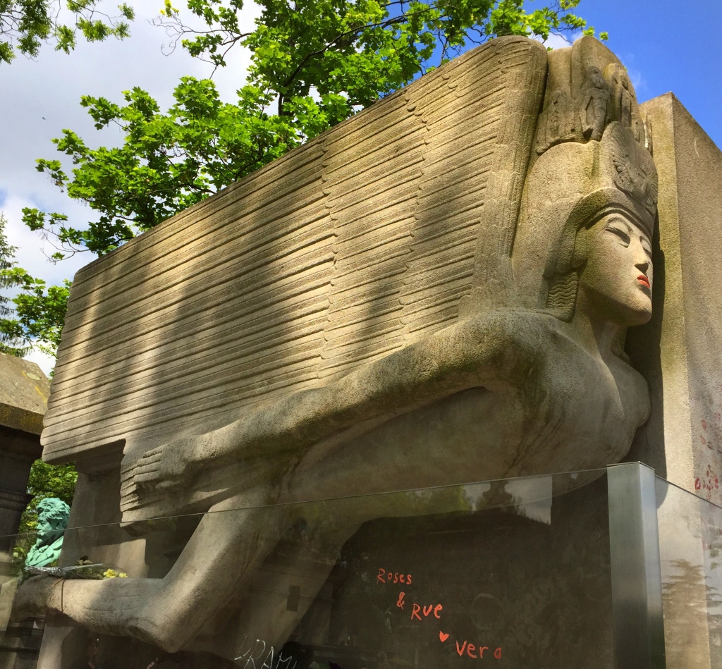 Not sure who added the lipstick to Oscar Wilde's tomb